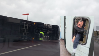 rsa İstanbul otobanında fırtına viyadükten geçen bir tırı devirdi. Tır sürücüsü