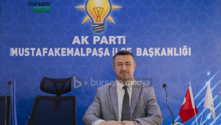 AK Parti Mustafakemalpaşa İlçe Başkanı Mutlu Turgut parti önünde fiziki