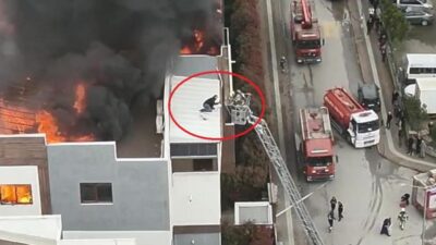Mahsur kalan ve dumandan etkilenen 2 çatı işçisi itfaiye ve